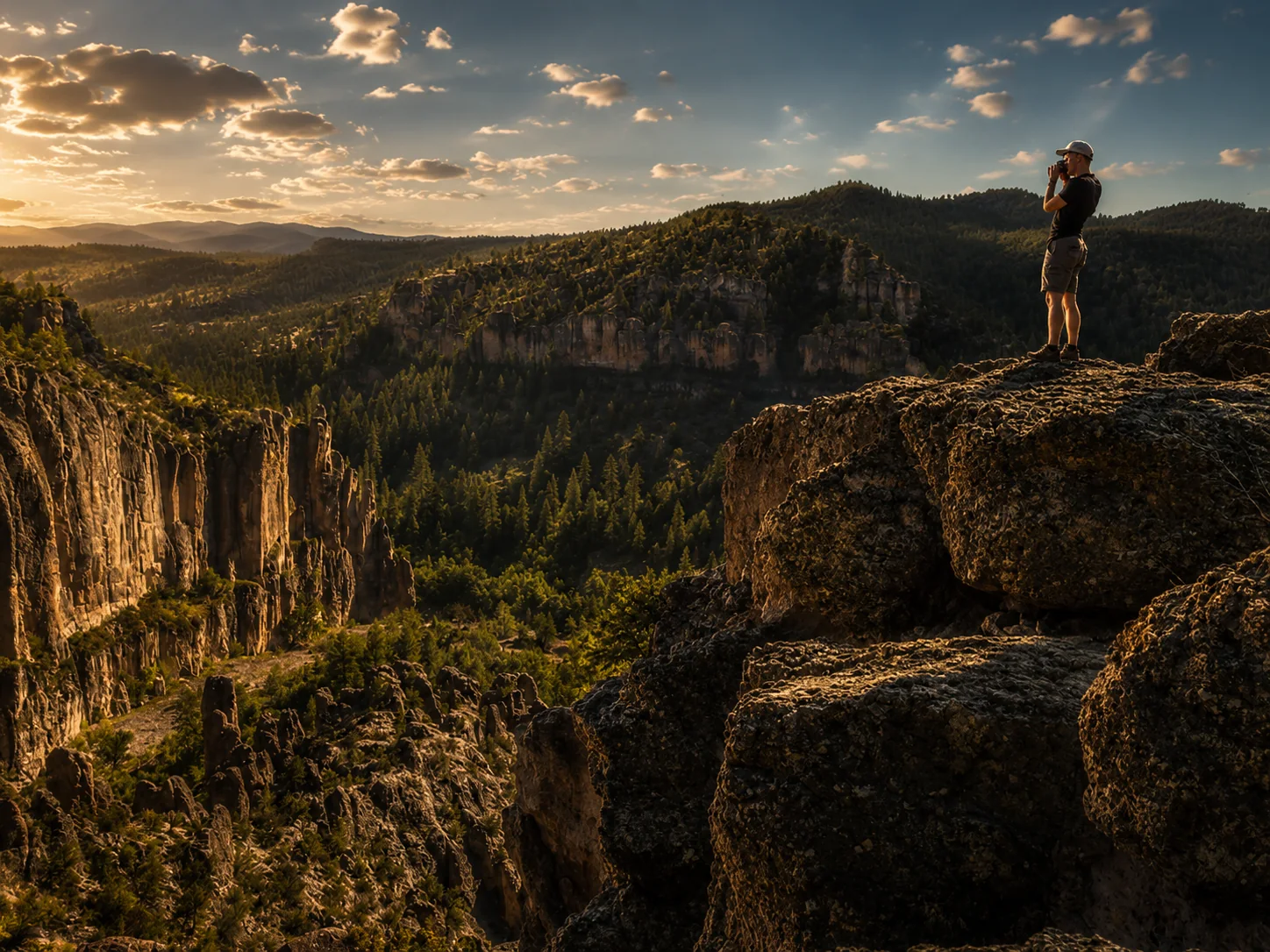 Dr. Spencer Hiebert photographing a mountain landscape