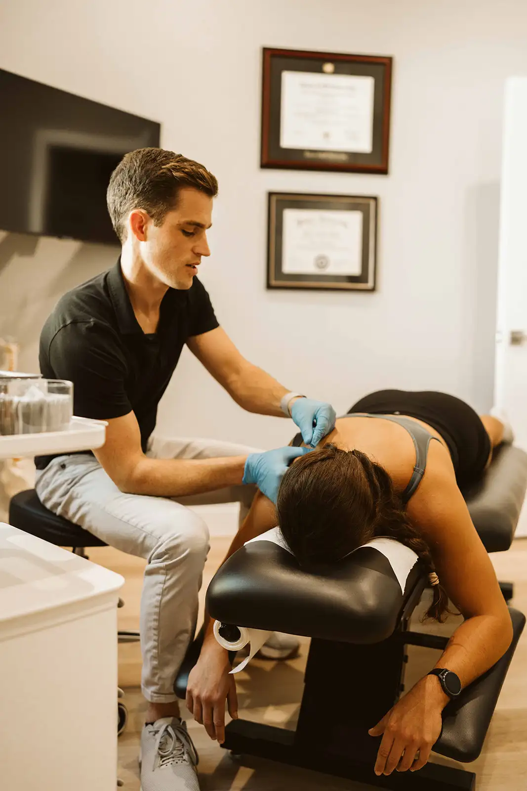 Dr. Hiebert providing dry needling treatment at Summit Spine & Wellness