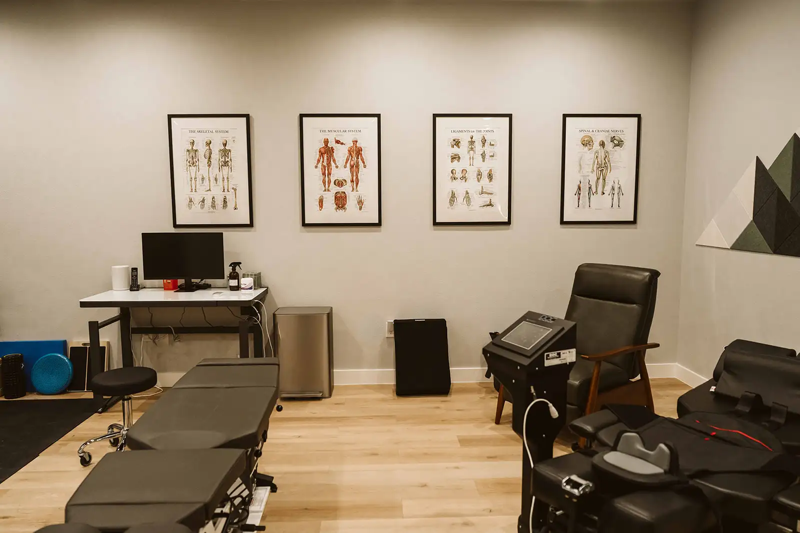 Chiropractic treatment tables and clinical equipment at Summit Spine & Wellness