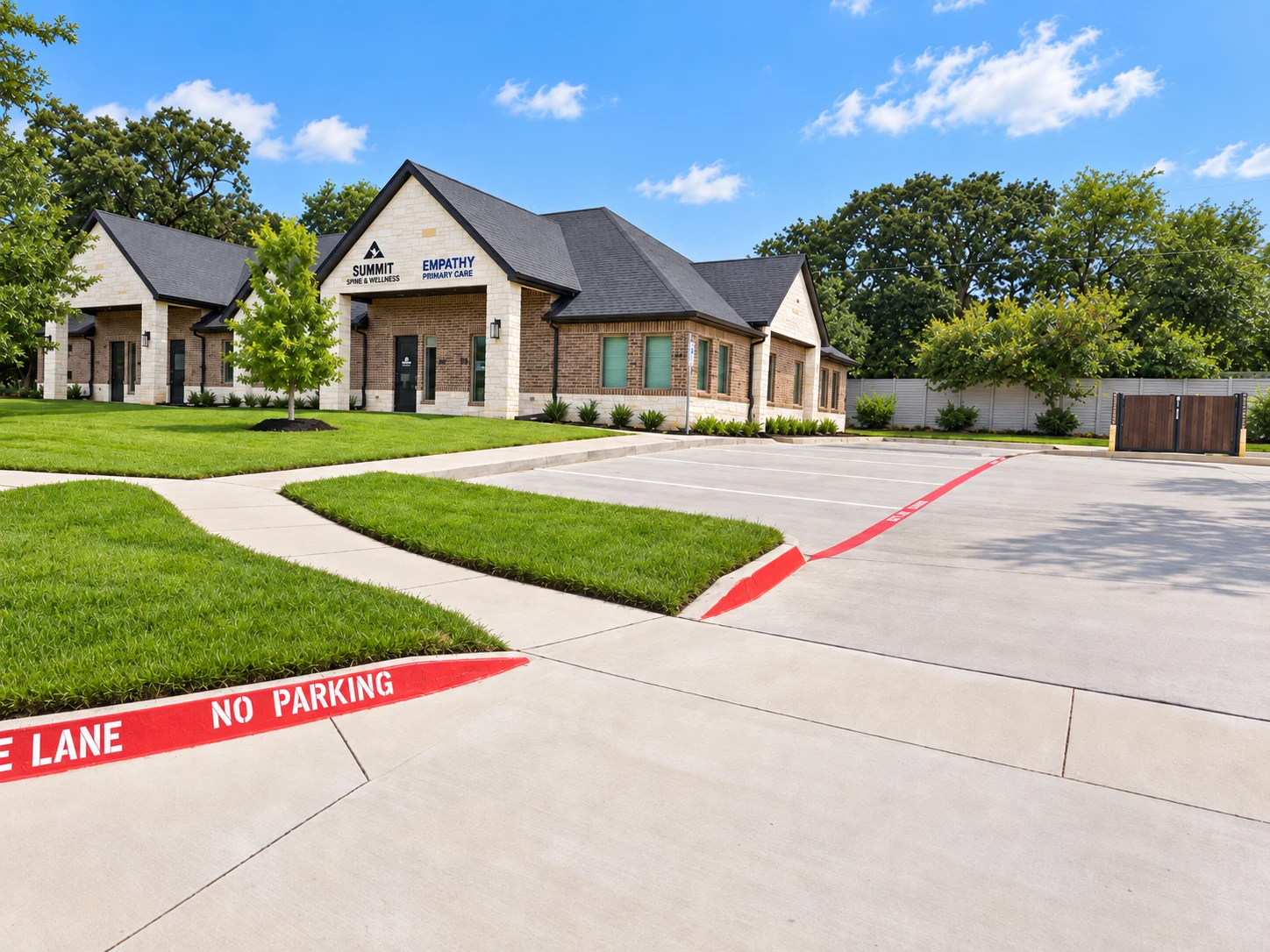 Summit Spine & Wellness building, entrance, and patient parking area in Colleyville, Texas