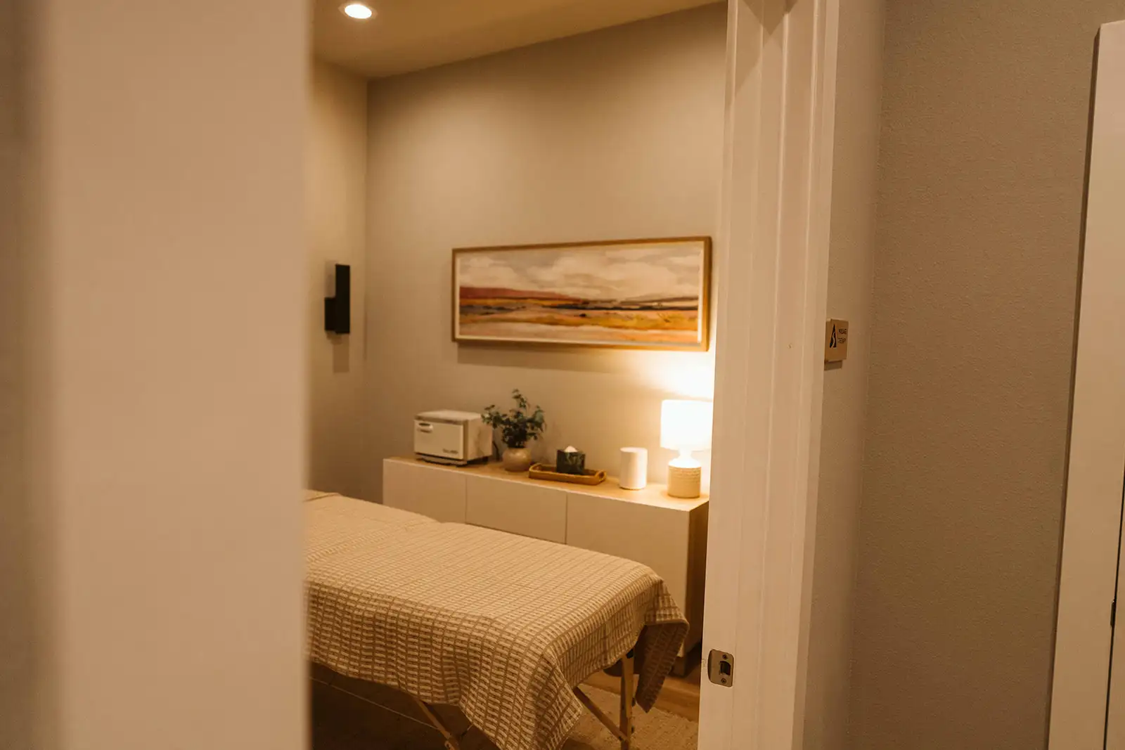 View through the doorway into Summit's massage room